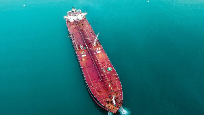 red cargo ship which can be protected with cargo insurance