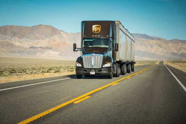 Teamster Union member driving in a UPS truck during contract negotiations.