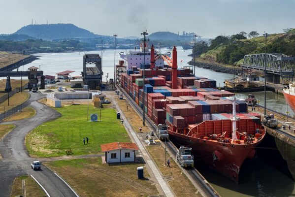 Containership transporting cargo through the Panama Canal during congestion.