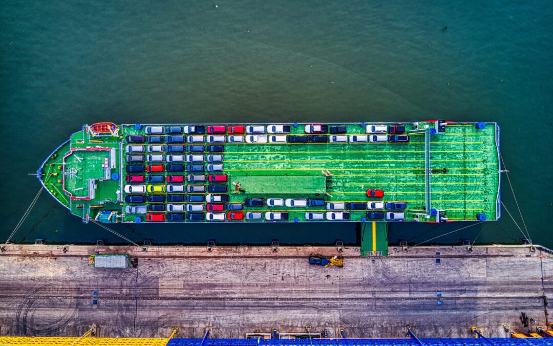 A Ro-Ro freight vessel with dozens of cars on it.
